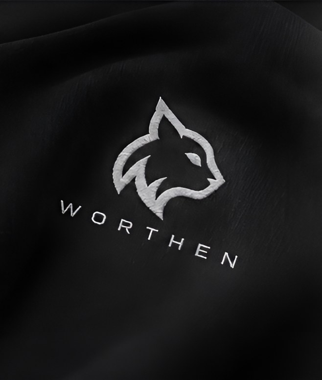 Silbernes Worthen-Emblem auf schwerem Stoff